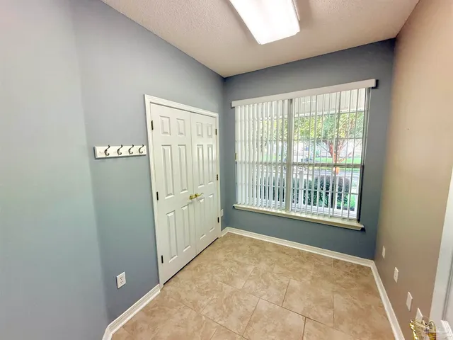 a view of a backyard with plants