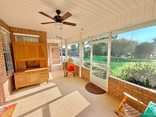 a view of park with large trees