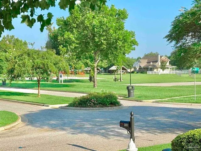 a house view with a garden space