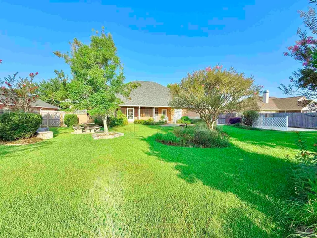a view of a garden with a slide