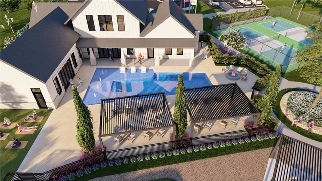 an aerial view of a house with wooden floor and outdoor space