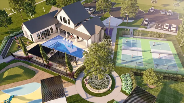 an aerial view of a house with swimming pool