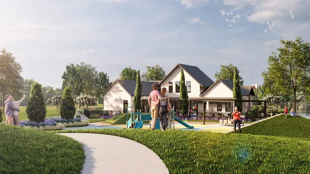 a view of a house with a big yard and potted plants and large trees
