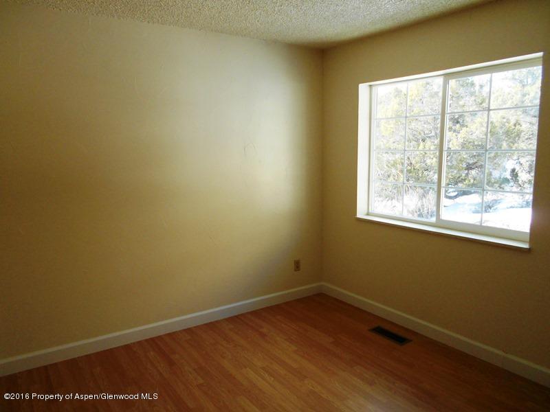 10874 Highway 13 Rifle, CO 81650 - Photo 12 of 15 an empty room with a window