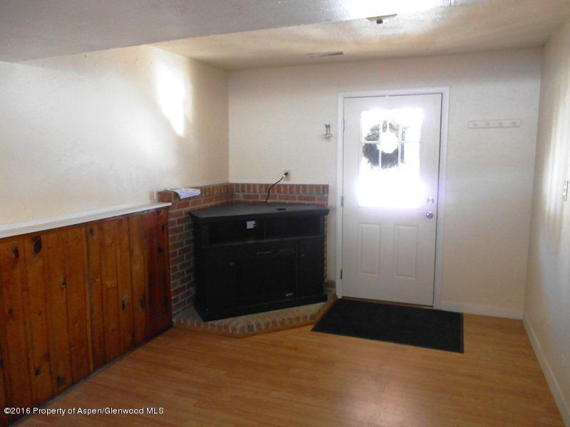 10874 Highway 13 Rifle, CO 81650 - Photo 15 of 15 a room with a closet and a lamp