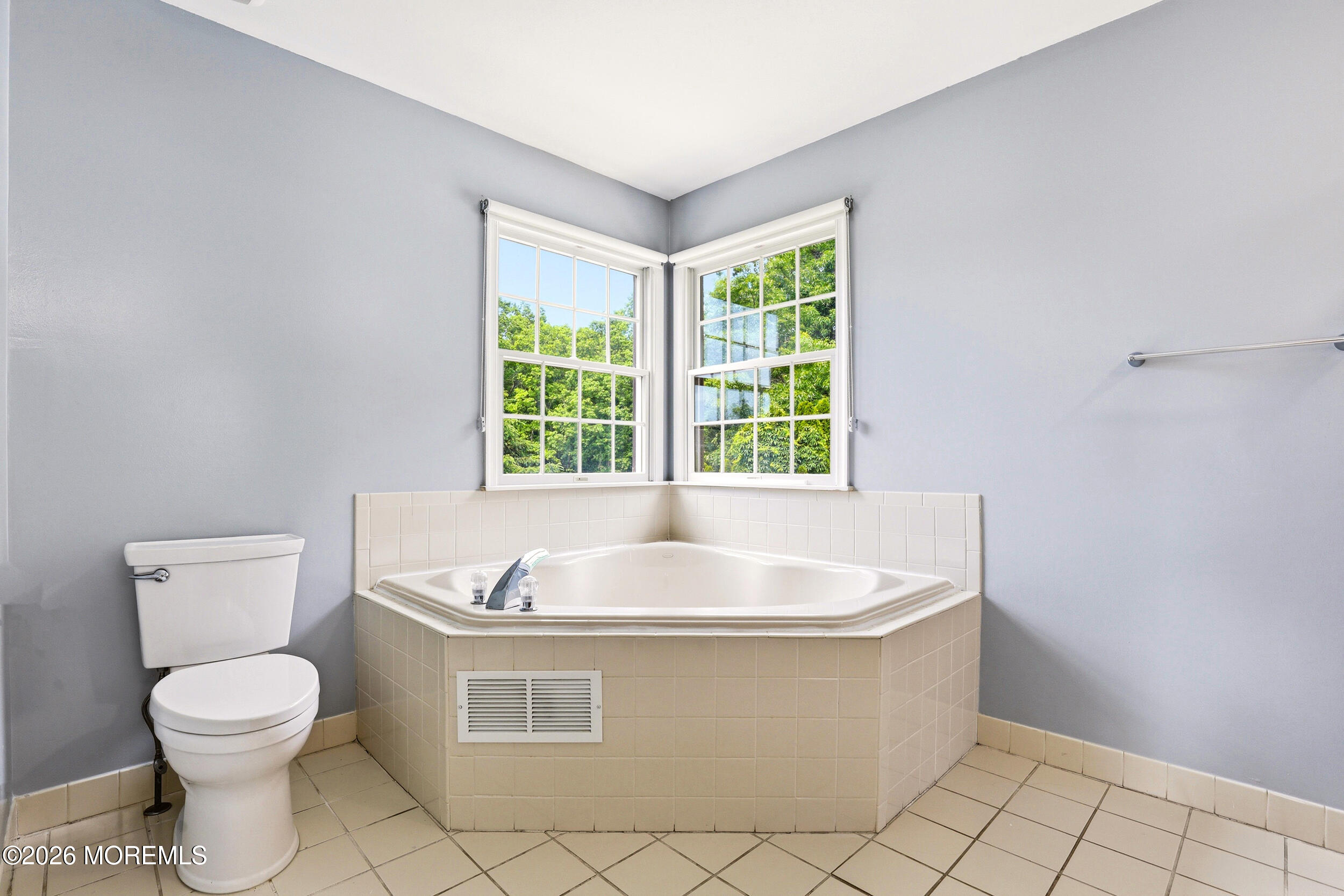 2055 MacKenzie Road Toms River, NJ 08755 - Photo 26 of 56 a spacious bathroom with a bathtub and toilet
