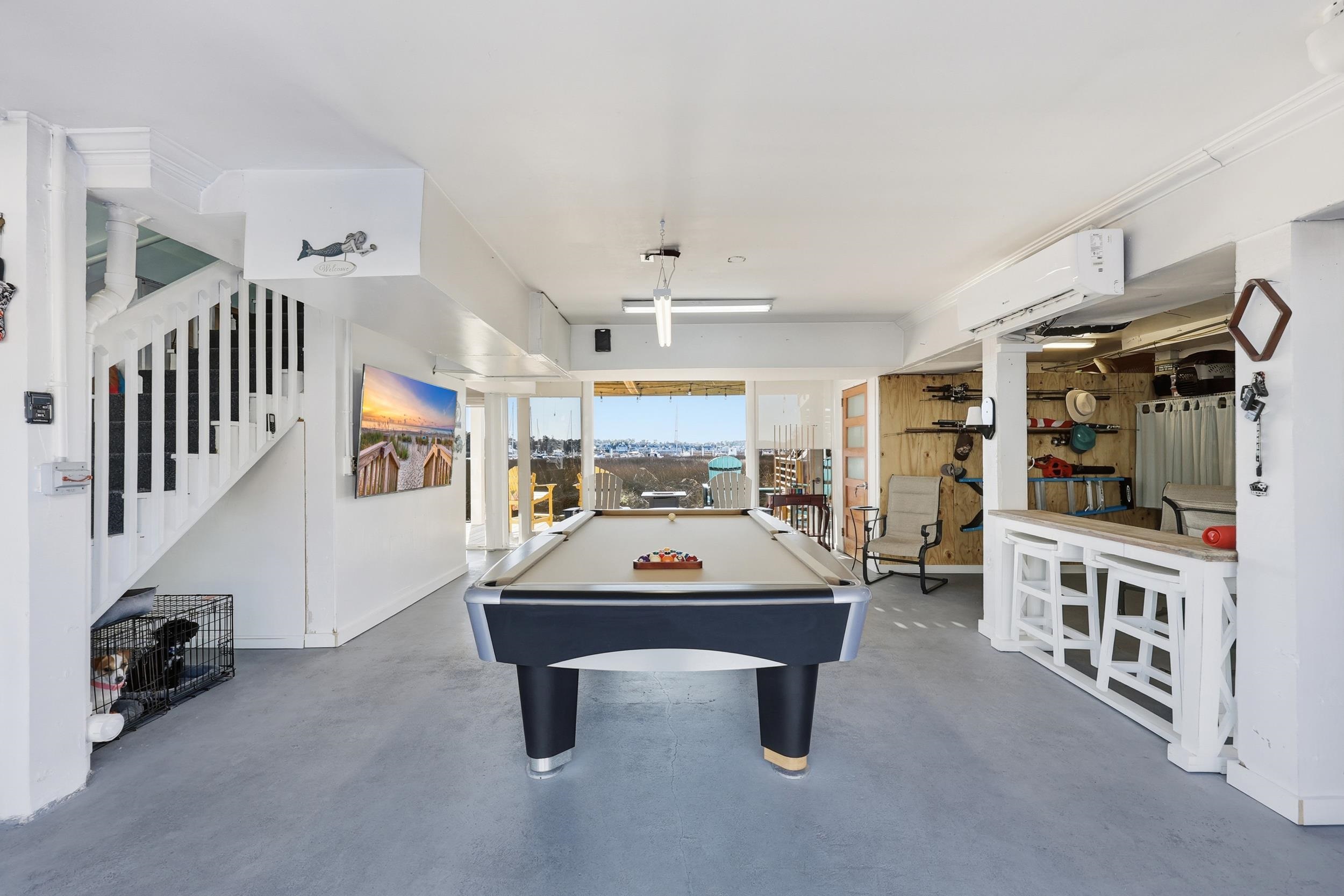 4524 Landing Road Little River, SC 29566 - Photo 29 of 40 Rec room featuring pool table, concrete flooring, and an AC wall unit