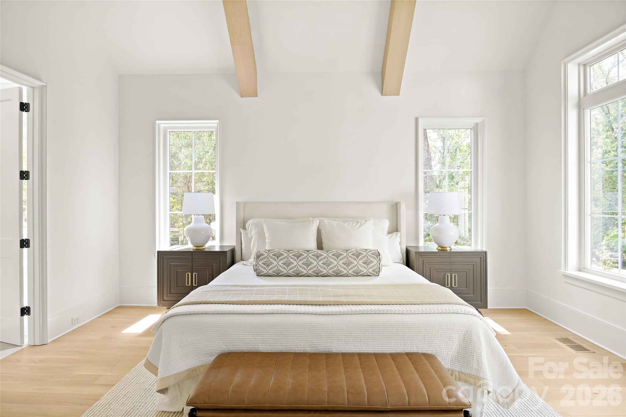 4628 Water Oak Road Charlotte, NC 28211 - Photo 18 of 43 a bedroom with a bed and wooden floor