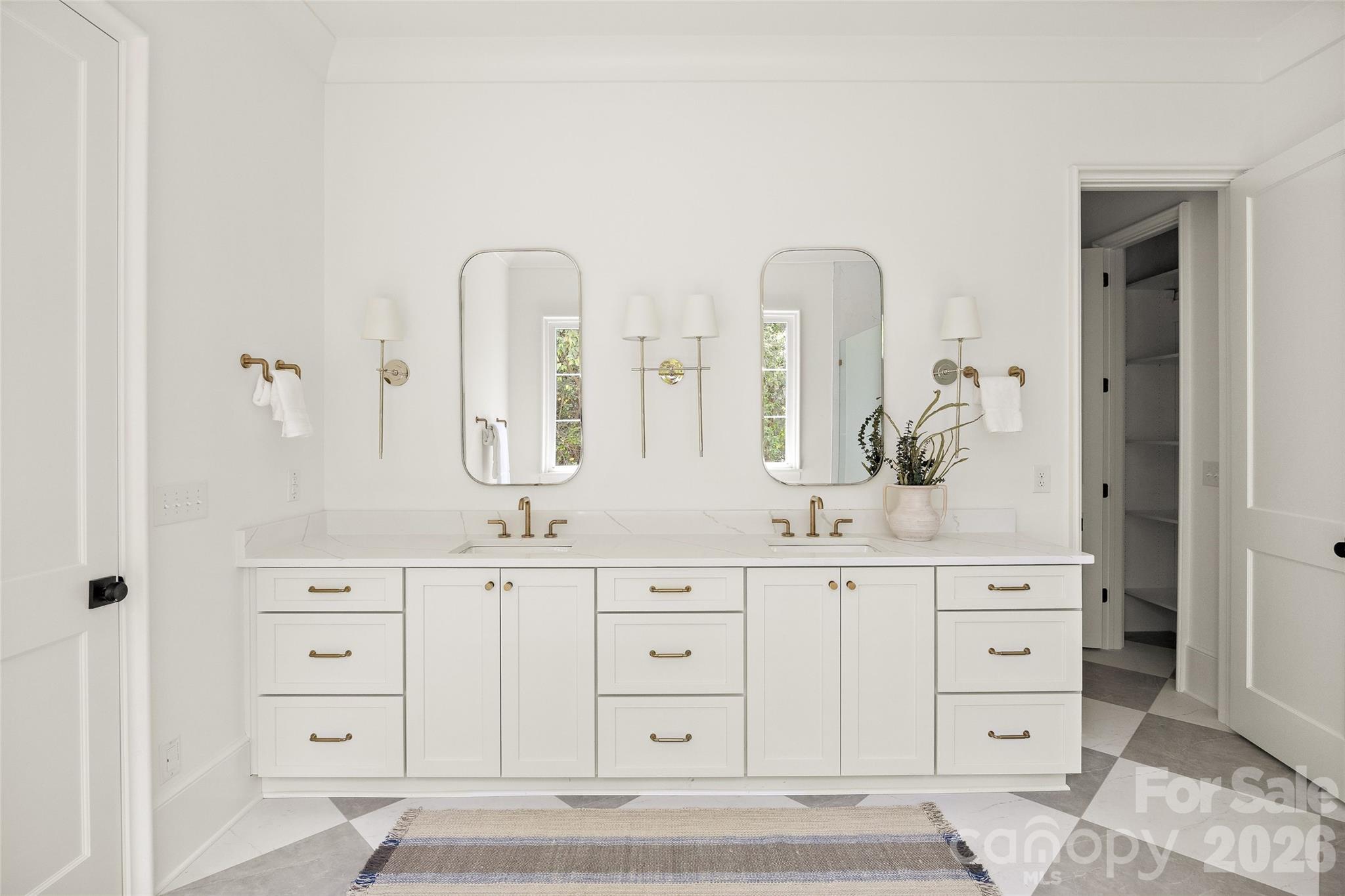 4628 Water Oak Road Charlotte, NC 28211 - Photo 20 of 43 a bathroom with a double vanity sink and a mirror