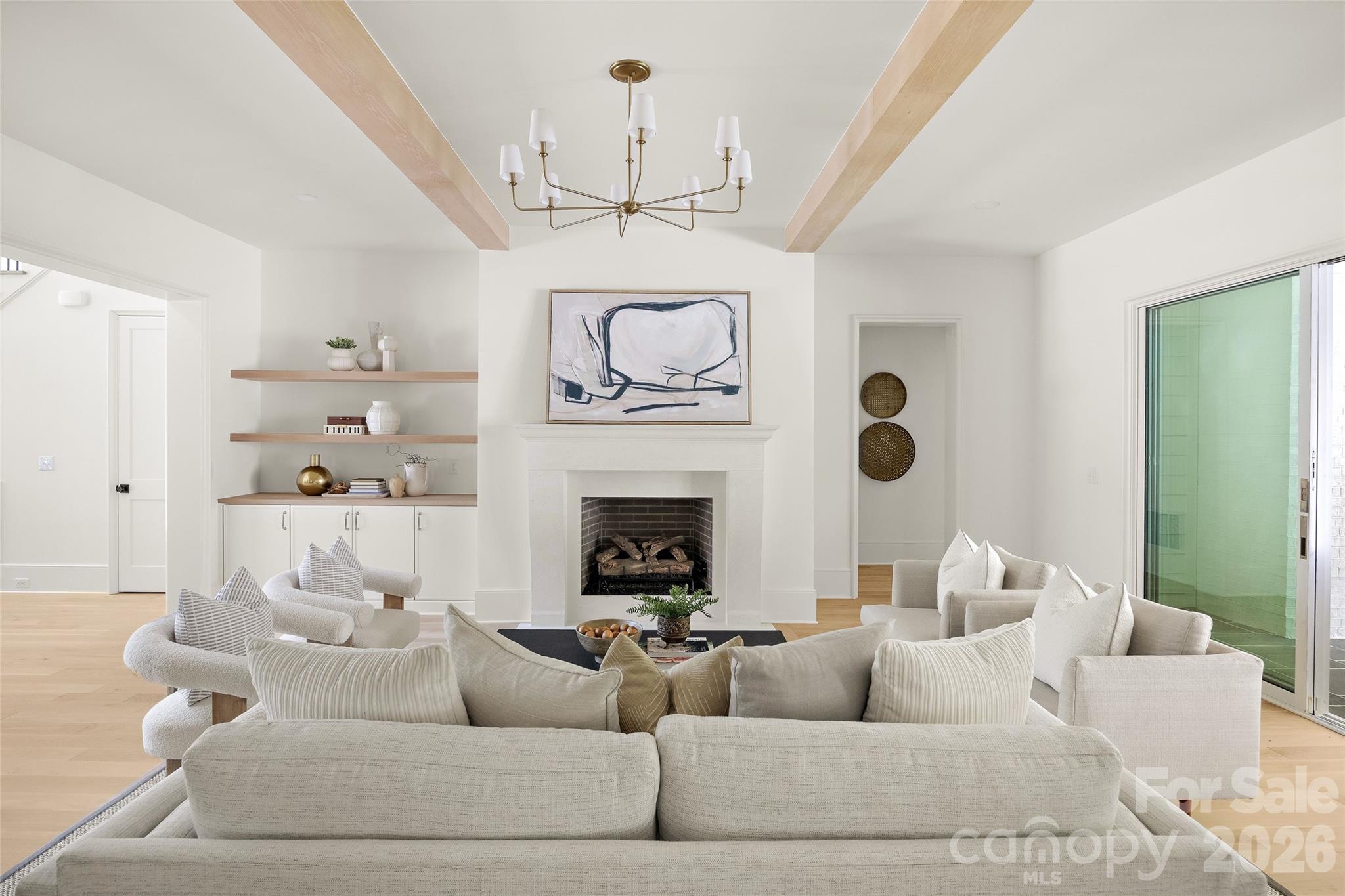 4628 Water Oak Road Charlotte, NC 28211 - Photo 2 of 43 a living room with furniture and a fireplace