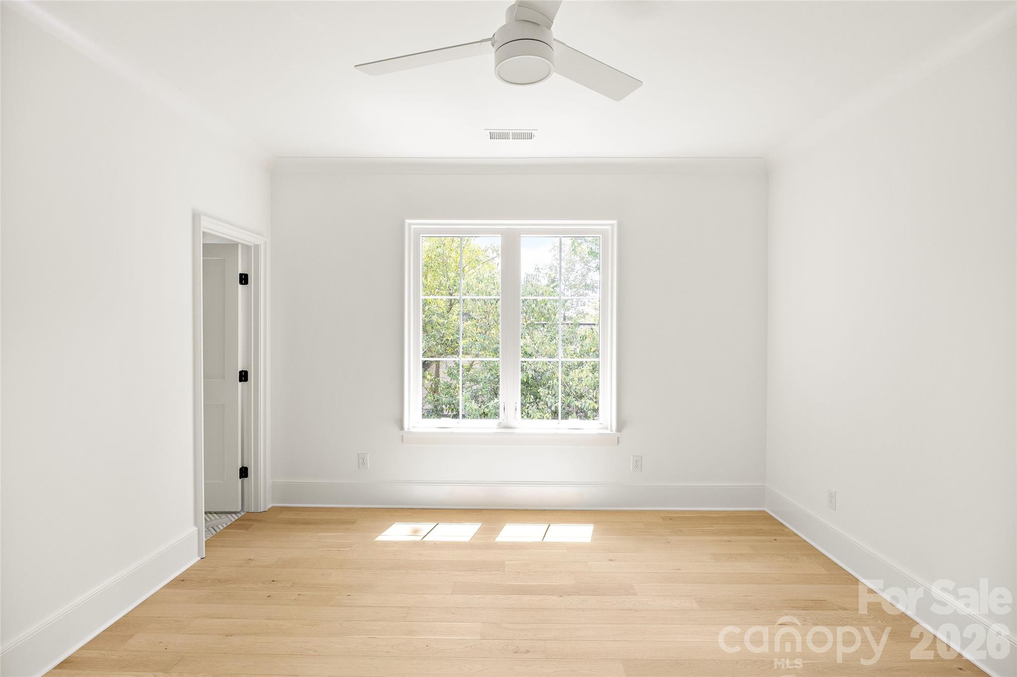 4628 Water Oak Road Charlotte, NC 28211 - Photo 31 of 43 a view of an empty room with a window