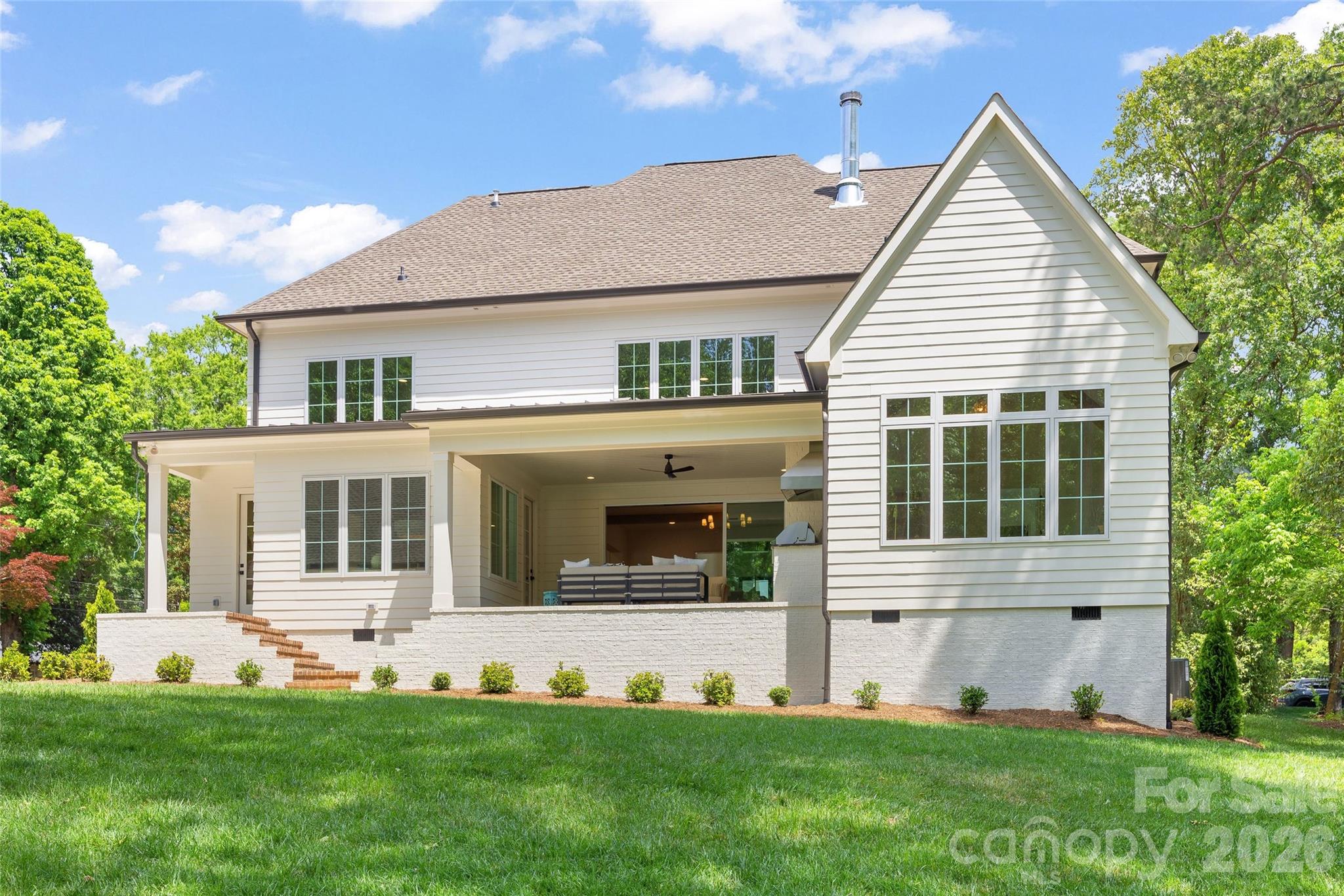 4628 Water Oak Road Charlotte, NC 28211 - Photo 40 of 43 a front view of a house with a yard
