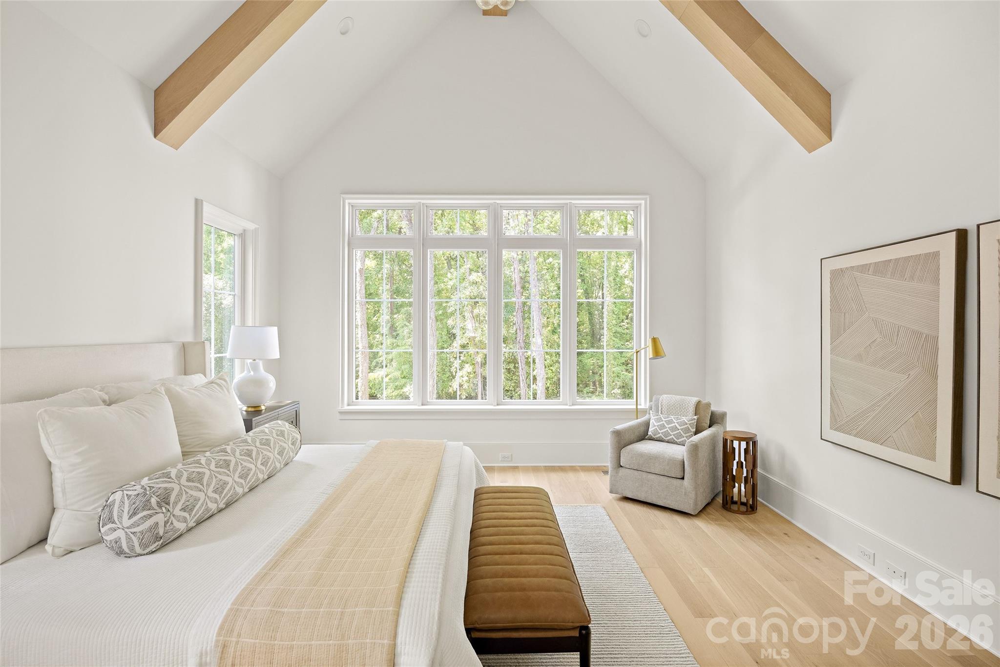 4628 Water Oak Road Charlotte, NC 28211 - Photo 4 of 43 a bedroom with bed and a large window