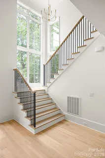 a view of a hallway with stairs
