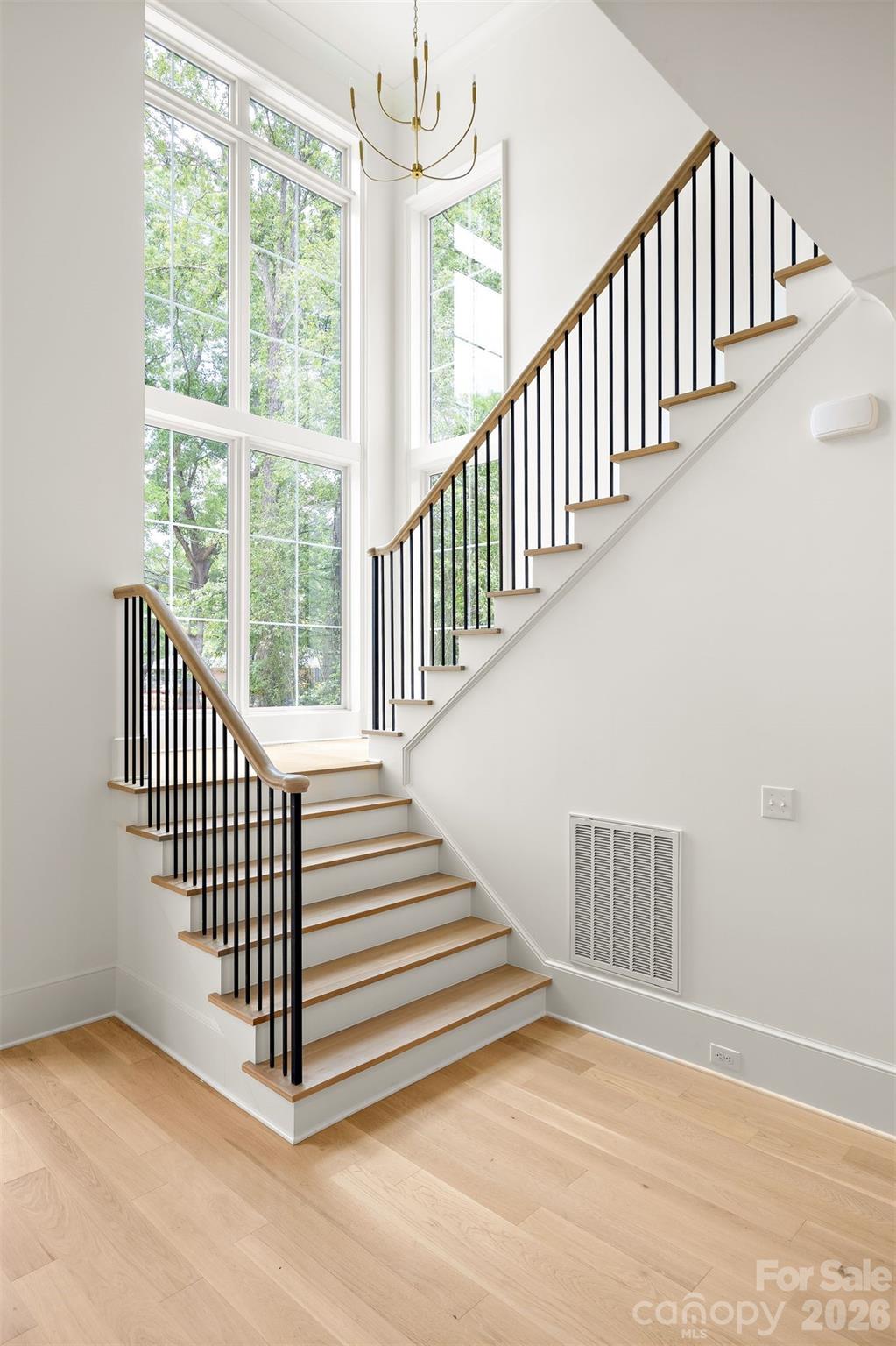 4628 Water Oak Road Charlotte, NC 28211 - Photo 7 of 43 a view of a hallway with stairs