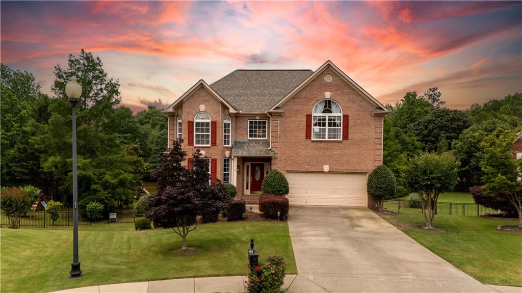 638 Glen Valley Way Dacula, GA 30019 - Photo 1 of 61 front view of house with a yard