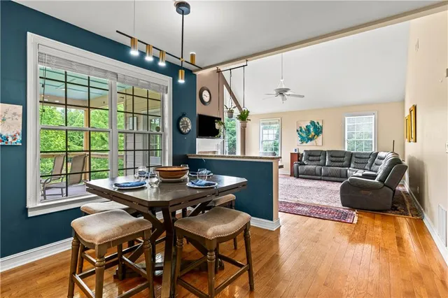 a living room with furniture and a rug