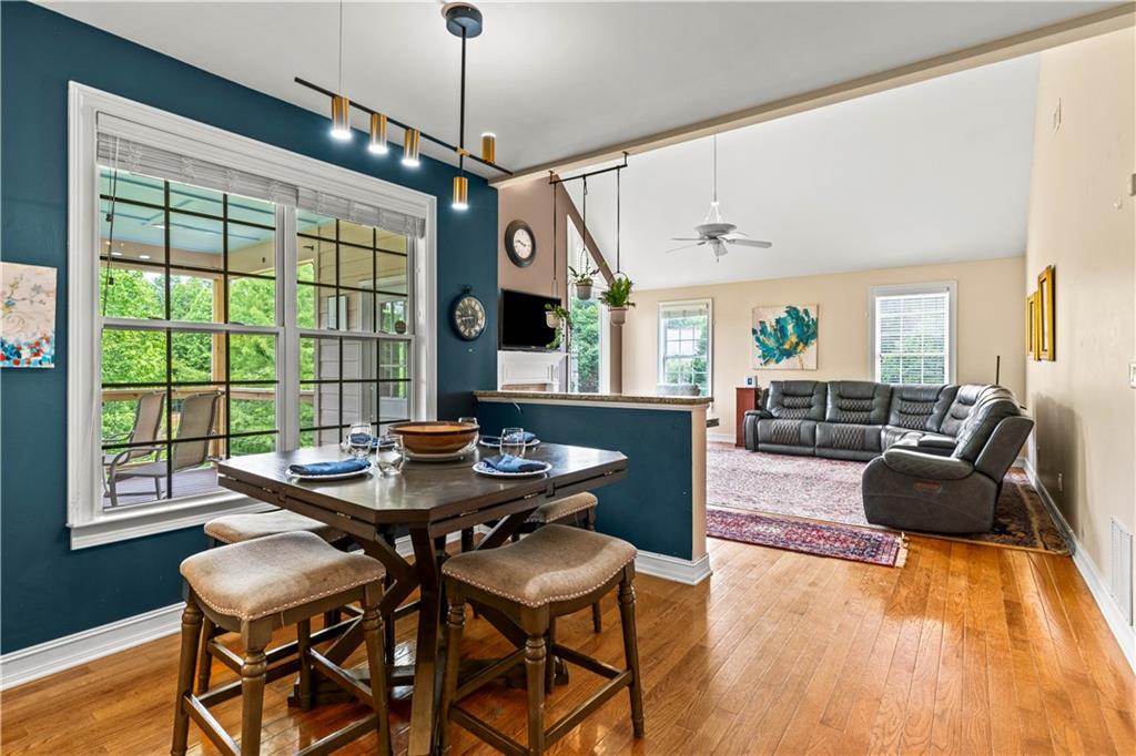 638 Glen Valley Way Dacula, GA 30019 - Photo 17 of 61 a view of a dining room with furniture window and wooden floor