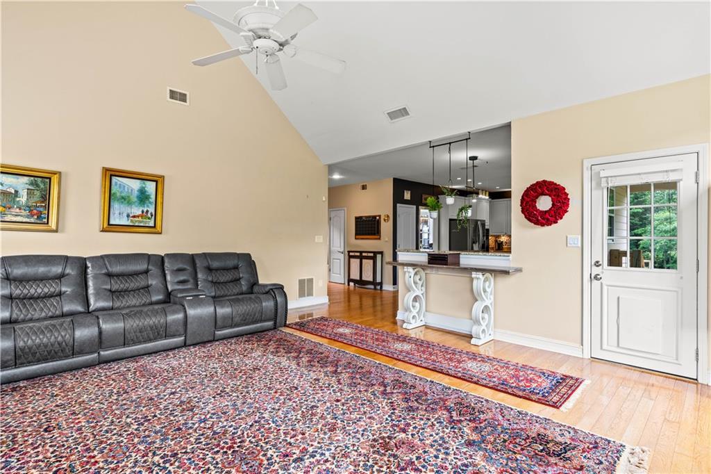 638 Glen Valley Way Dacula, GA 30019 - Photo 20 of 61 a living room with furniture and a rug