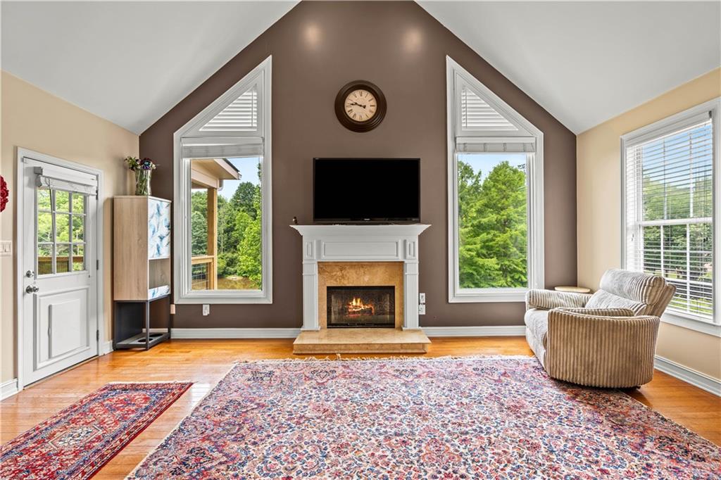 638 Glen Valley Way Dacula, GA 30019 - Photo 23 of 61 a living room with furniture and a fireplace