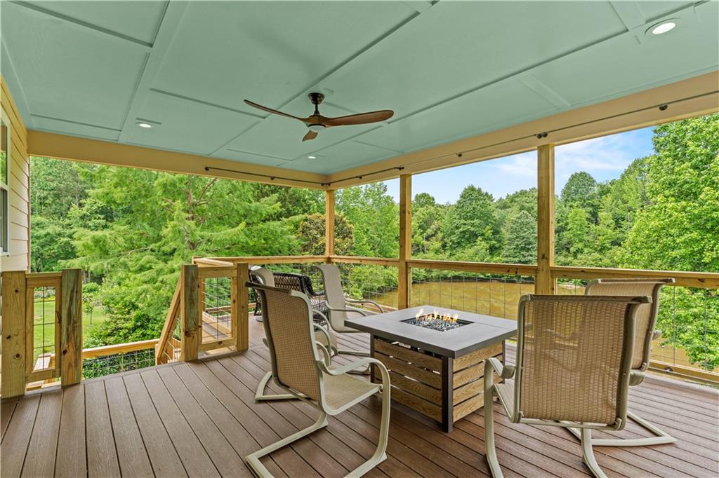 638 Glen Valley Way Dacula, GA 30019 - Photo 25 of 61 a view of a balcony with furniture and wooden floor