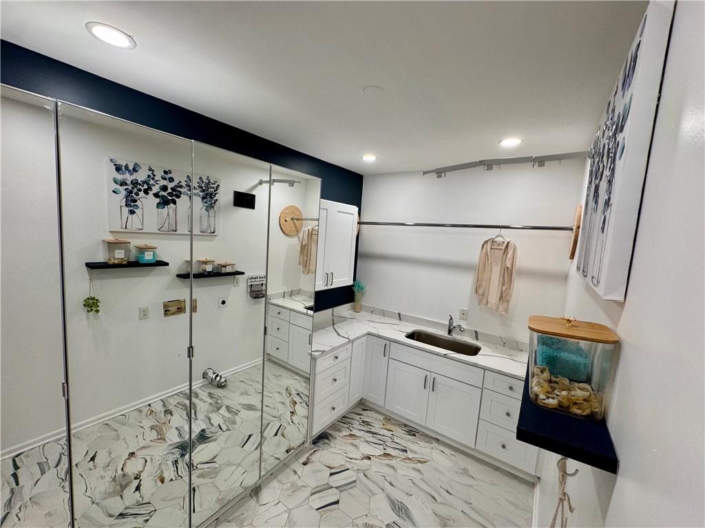 638 Glen Valley Way Dacula, GA 30019 - Photo 43 of 61 a kitchen with stainless steel appliances a refrigerator and cabinets