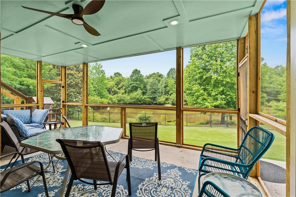 638 Glen Valley Way Dacula, GA 30019 - Photo 50 of 61 a view of a city from a dining room with furniture and a window
