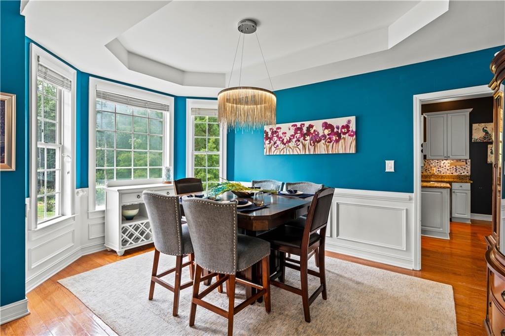 638 Glen Valley Way Dacula, GA 30019 - Photo 5 of 61 a view of a dining room with furniture window and wooden floor