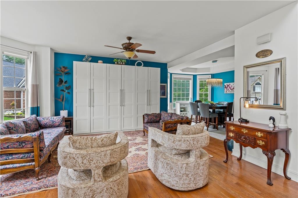 638 Glen Valley Way Dacula, GA 30019 - Photo 8 of 61 a living room with furniture and a large window