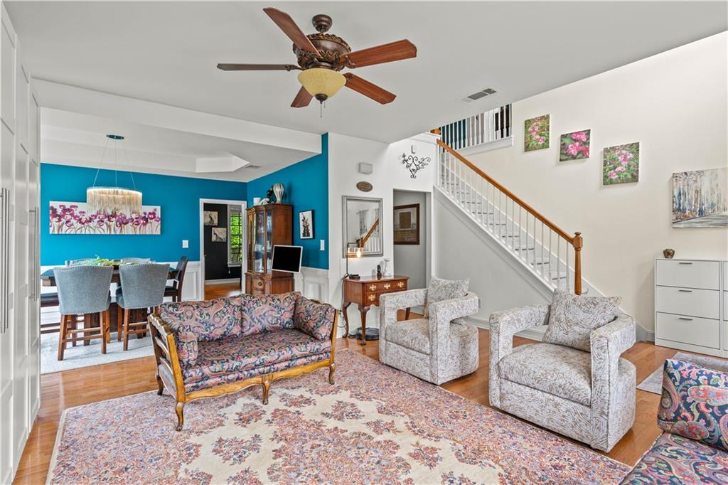 638 Glen Valley Way Dacula, GA 30019 - Photo 10 of 61 a living room with furniture and wooden floor