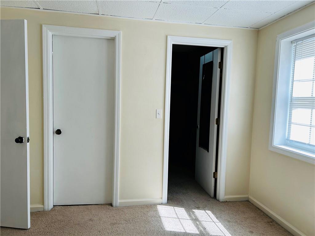 55 Johnson Ferry Road Atlanta, GA 30328 - Photo 12 of 30 an empty room with windows and closet