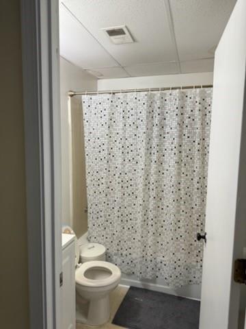 55 Johnson Ferry Road Atlanta, GA 30328 - Photo 14 of 30 a bathroom with a toilet and a shower curtain
