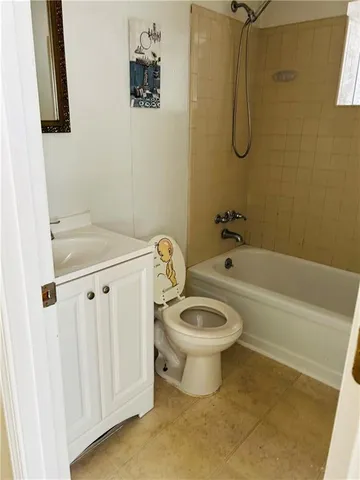 a bathroom with a bath tub and a shower