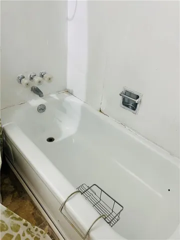 a bathroom with a bathtub