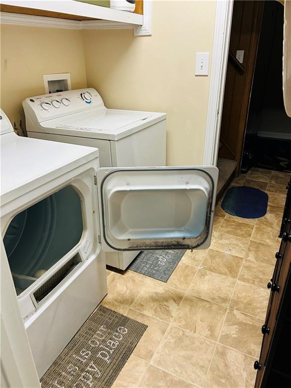 55 Johnson Ferry Road Atlanta, GA 30328 - Photo 24 of 30 a utility room with dryer and washer