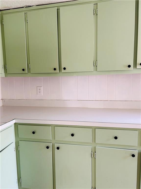 55 Johnson Ferry Road Atlanta, GA 30328 - Photo 25 of 30 a close view of a cabinets and a wooden door