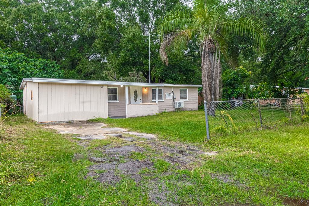 6641 Shady Acres Boulevard New Port Richey, FL 34653 - Photo 1 of 1 a view of a house with backyard and sitting area