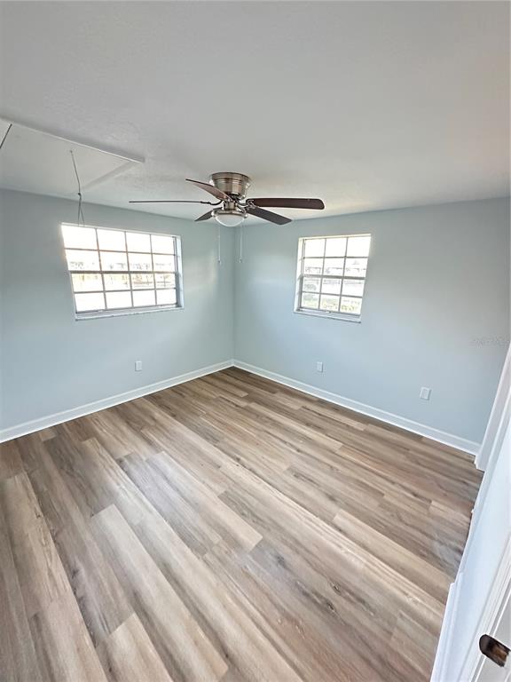 4407 Summersun Drive New Port Richey, FL 34652 - Photo 12 of 34 an empty room with windows