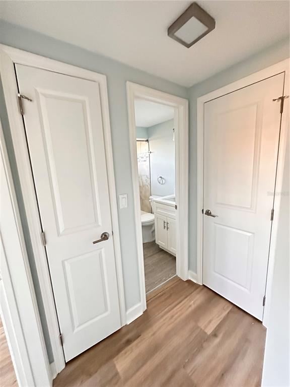 4407 Summersun Drive New Port Richey, FL 34652 - Photo 16 of 34 a view of a bathroom from a hallway