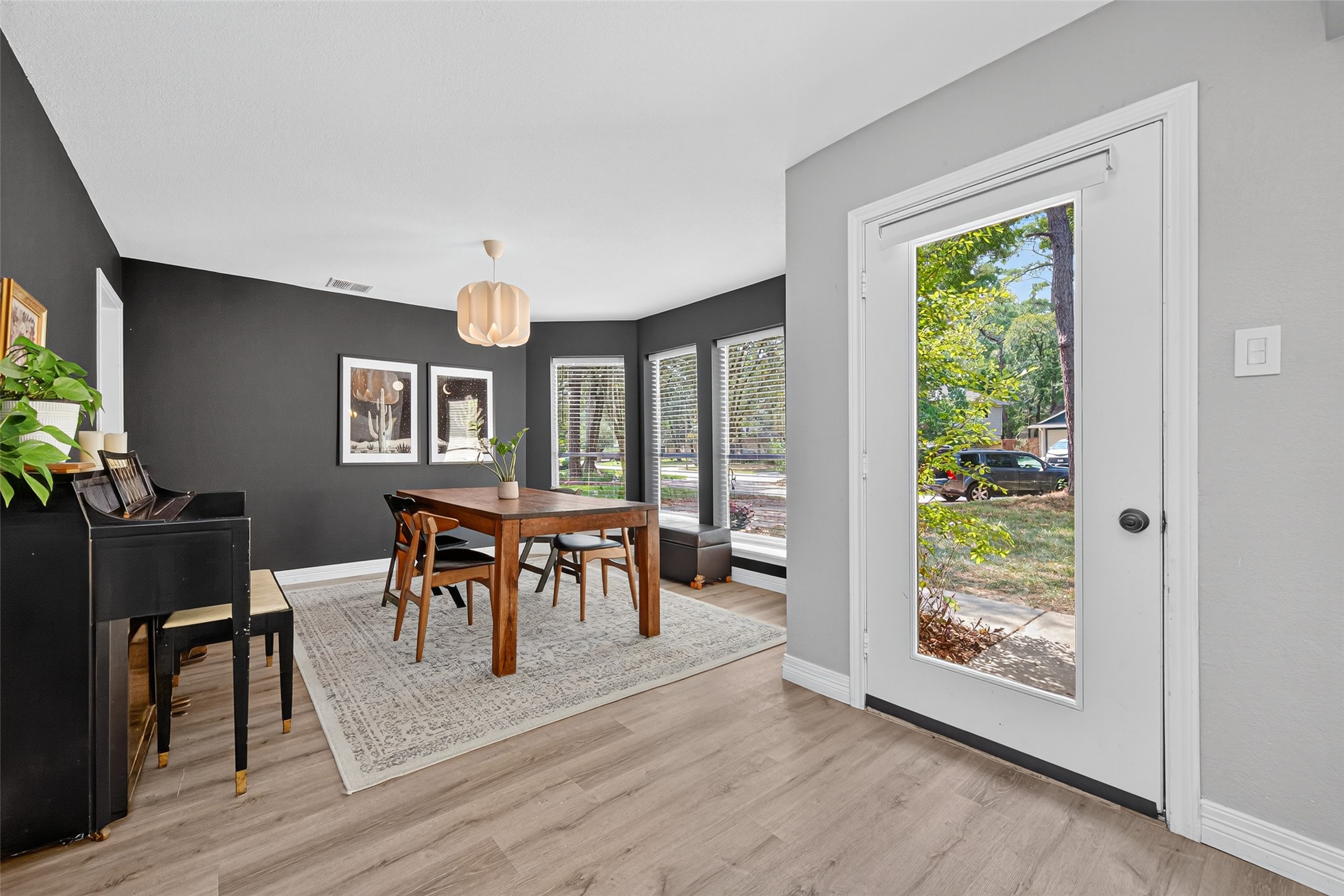 56 North Morningwood Court Spring, TX 77380 - Photo 7 of 50 Formal dining room featuring dramatic colors