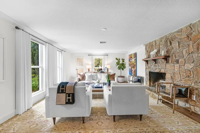 a workspace with furniture and window