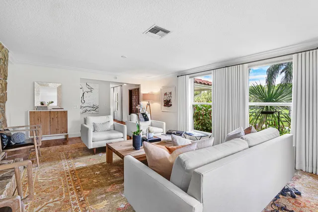 a bathroom with a sink toilet and mirror