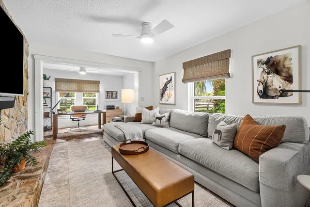 a kitchen with granite countertop a stainless steel appliances and wooden floor