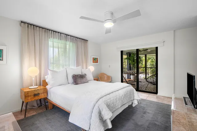a view of a chairs and table in the garden