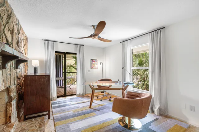 a view of a backyard with wooden floor