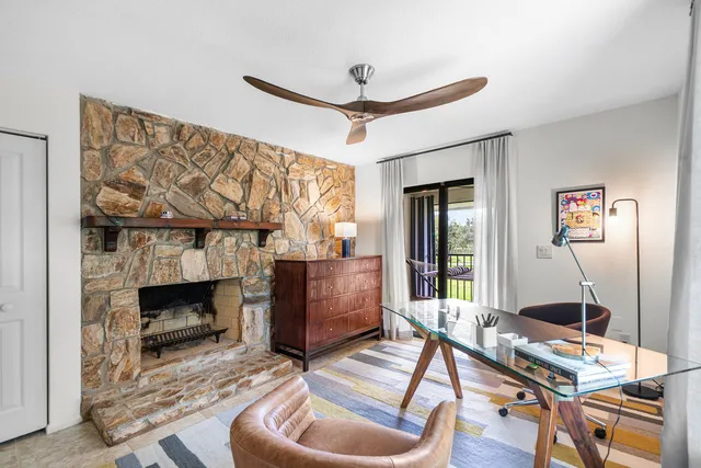 a view of a green field with lake view