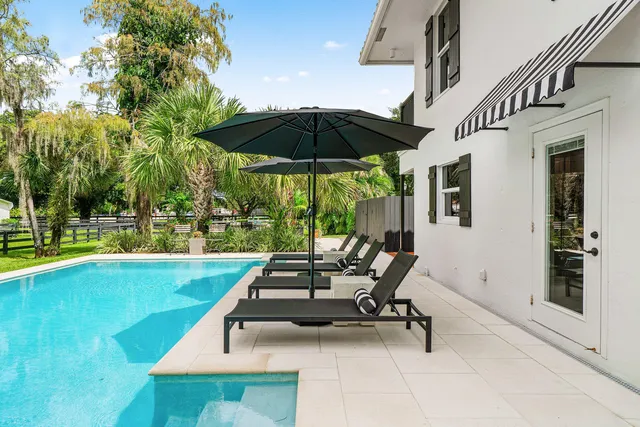 a storage & utility room with two washing machine