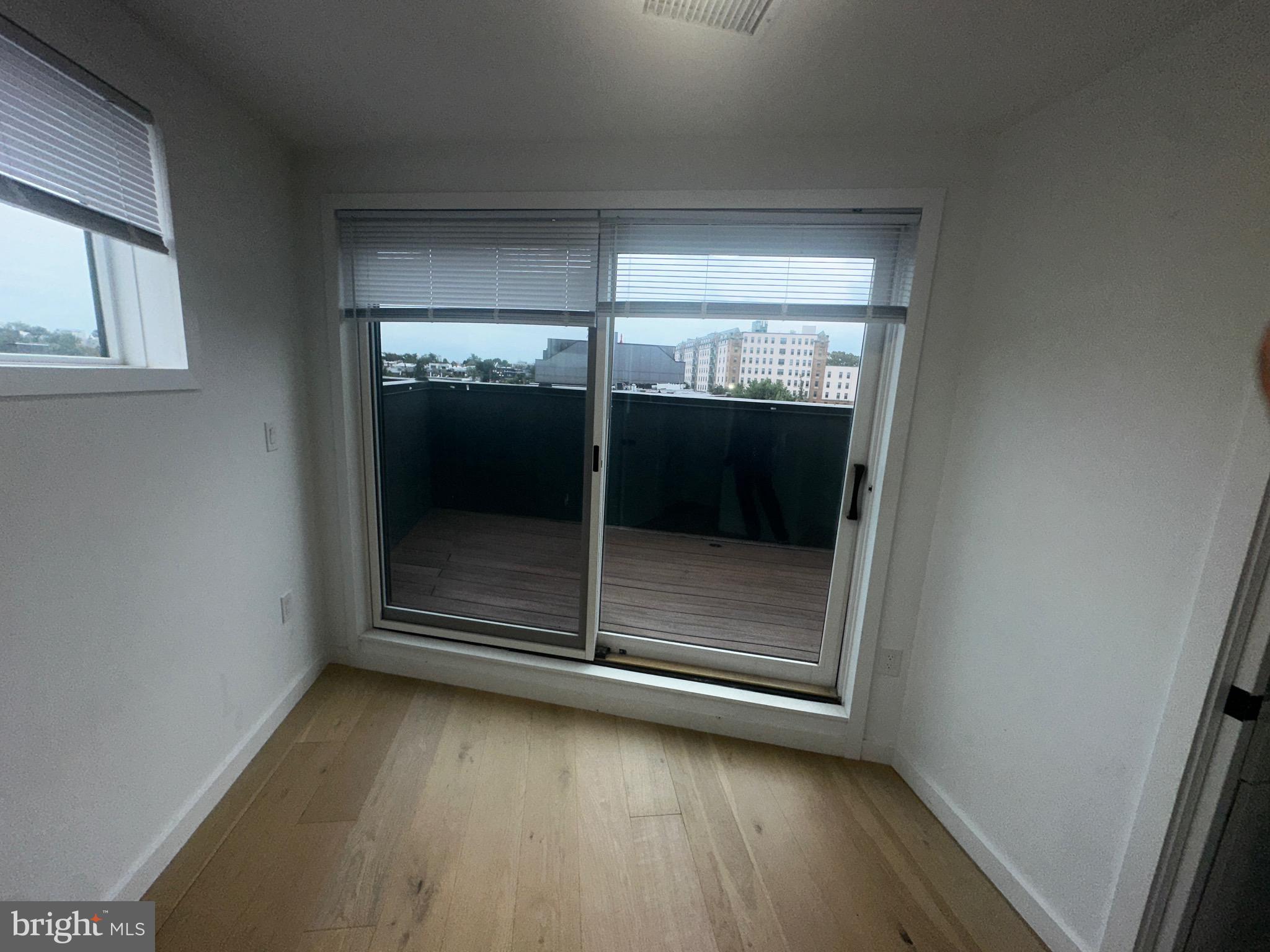 3601 14th Street Northwest Washington, DC 20010 - Photo 19 of 31 a view of wooden floor in an empty room