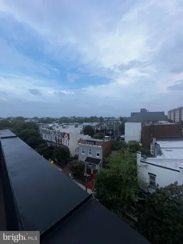 a view of balcony with furniture