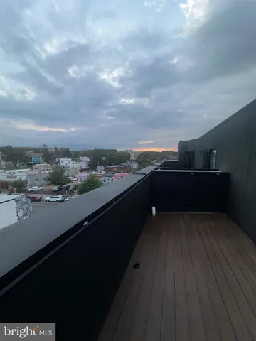 a view of a glass door and the balcony